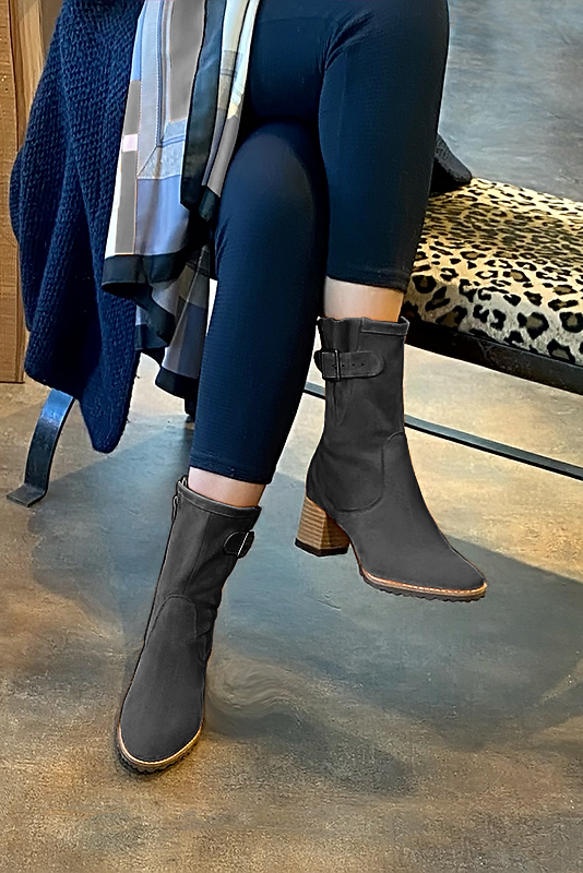 Dark grey women's ankle boots with buckles on the sides. Round toe. Medium block heels. Worn view - Florence KOOIJMAN
